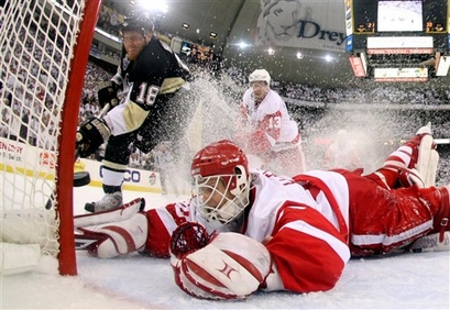 Chris Osgood went from the bench to the Dream Team after taking over for Dominik Hasek in round one.